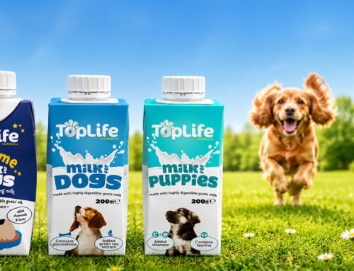 WIN six months of milk for dogs PLUS a TopLife bundle of treats & merch!